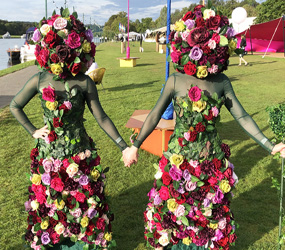 Fairy Tale Themed Entertainment - Femmes de Fleur Flower head girls hire -luxury walkabout act