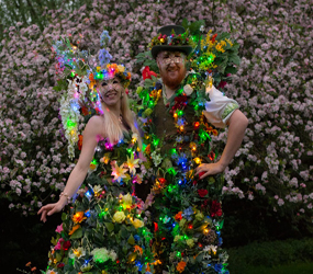 Magical Midsummer entertainment - LED flower stilt walkers hire Birmingham