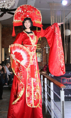 CHINESE NEW YEAR THEMED STILTS PERFECT FOR SHOPPING CENTRES OR PRODUCT LAUNCHES