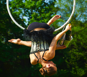 SUMMER GARDEN ACTS AERIAL CHAMPAGNE SERVICE PERFECT LUXURY ENTERTAINMENT FOR GARDEN PARTIES AND WEDDINGS