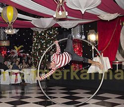 CIRCUS THEMED ENTERTAINMENT - DRAMATIC WHEEL ACROBAT TO HIRE UK AND OVERSEAS 
