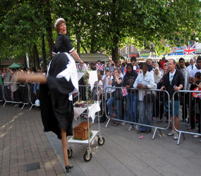 DANCING TEA LADY & MUSICAL TROLLEY STILTS HIRE -GREAT FOR FOOD FESTIVALS , BEST OF BRITISH AND JUBILEE PARTIES 