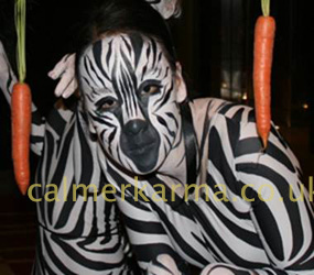 jungle themed acts- zebra hostesses to hire