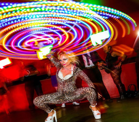 Festival style acts to hir e-circus entertainment - LED HULA HOOPER ACTS TO HIRE MANCHESTER LONDON UK