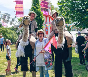 JUNGLE THEMED ENTERTAINMENT - OSTRICH RIDER STILTS TO HIRE
