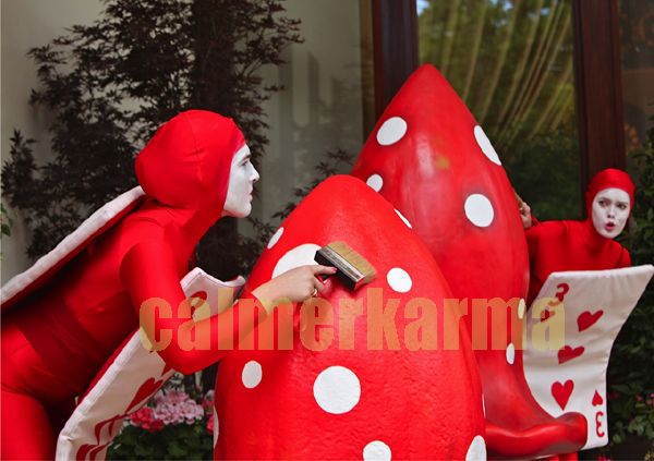 ALICE IN WONDERLAND THEMED ACTS TO HIRE - RED CARD COMICAL WALKABOUT ACTs to hire - LONDON